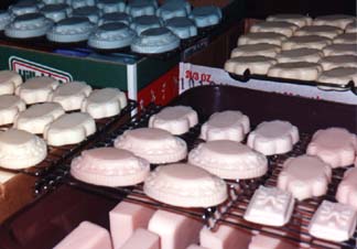 [Homemade Soaps Drying on Racks]